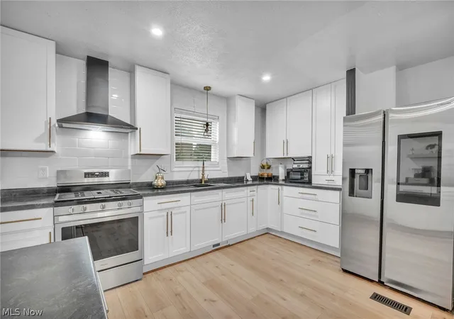 Photo 3 of Sale Pending at 7712 Spafford Rd, Cleveland, OH 44105 | MLS# 5239581 | Listing updated on 2026-09-01