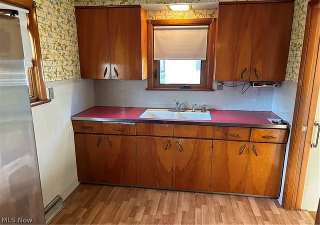 Photo 2 of Single family home for sale at 6908 Orchard Blvd, Parma Heights, OH 44130 | MLS# 5240547 | Listing updated on 2026-08-28