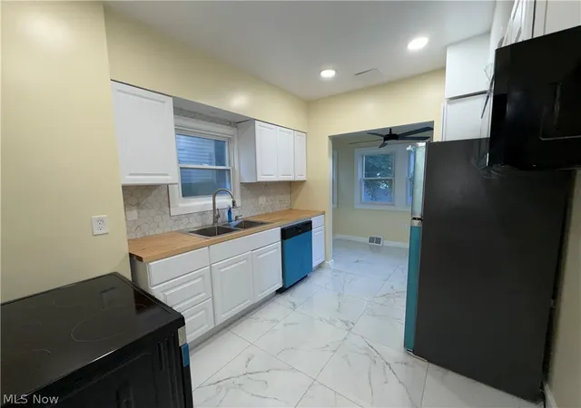 Photo 3 of Single family home for sale at 13511 6th Avenue, Cleveland, OH 44112 | MLS# 5243573 | Listing updated on 2026-09-16