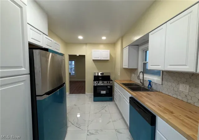 Photo 4 of Single family home for sale at 13511 6th Avenue, Cleveland, OH 44112 | MLS# 5243573 | Listing updated on 2026-09-16