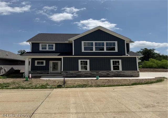 Listing Photo 1 - Condo for sale in building located at 7911 Brushwood Ln, Painesville, OH 44077