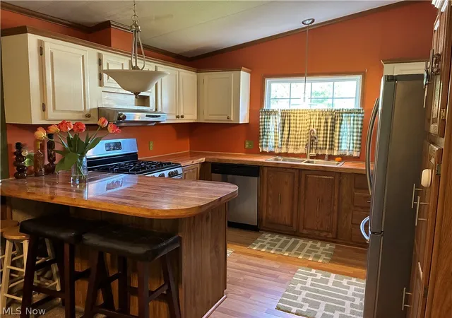 Photo 3 of Single family home for sale at 63 Parkway Dr, Olmsted Twp, OH 44138 | MLS# 5246455 | Listing updated on 2026-09-19