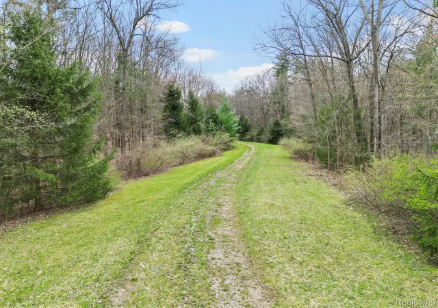3rd image of 423 Acres Vl - Knights Bridge Rd, Leonard, MI 48367 | MLS# 20251013474