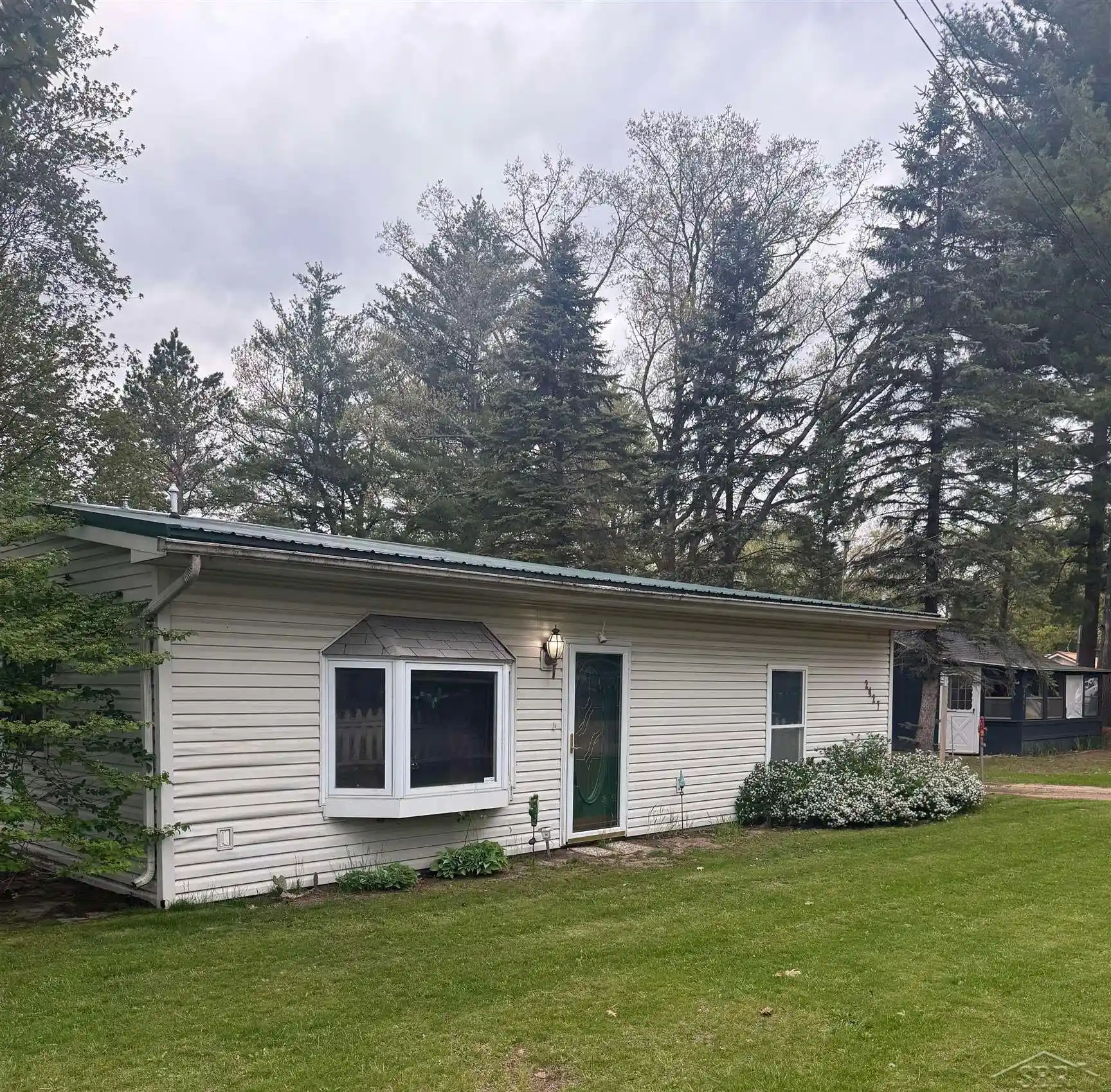 Photo 1 of Single family home for sale at 2427 Courtney Dr, Harrison, MI 48625 | MLS# 61050194070 | Listing updated on 2026-10-13