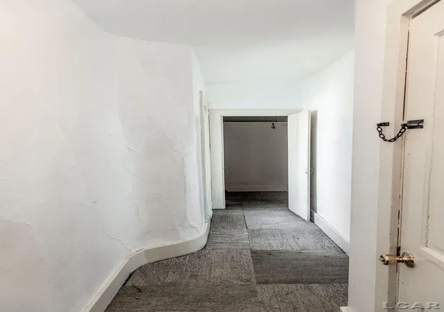 Listing Photo 2 - Condo for sale in building located at 324 Railroad St, Hudson, MI 49247 - Unit #