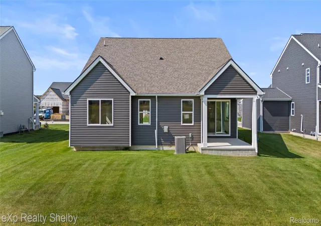 Photo 2 of Single family home for sale at 52120 Wellington Valley Dr, Macomb, MI 48042 | MLS# 20261006781 | Listing updated on 2026-10-16