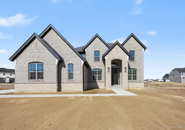 1st image of 56270 Stone Falcon E, Utica, MI 48315 | MLS# 20261015571