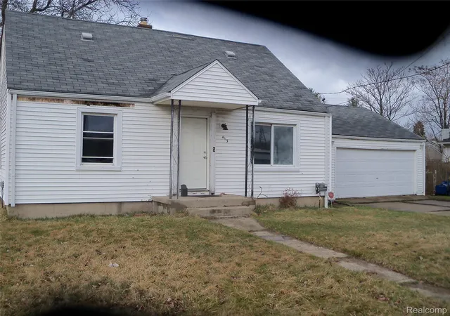 Photo 2 of Single family home for sale at 413 E Hemphill Rd, Flint, MI 48507 | MLS# 20261021708 | Listing updated on 2026-07-06