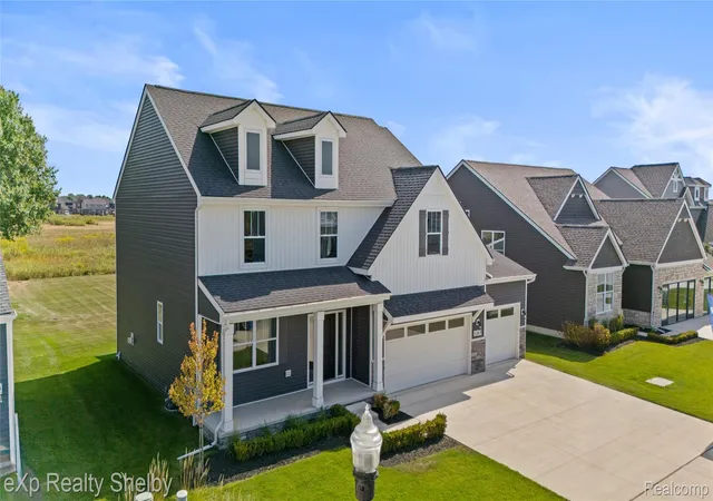 Photo 2 of Single family home for sale at 52000 Wellington Valley Dr, Macomb, MI 48042 | MLS# 20261023117 | Listing updated on 2026-10-16