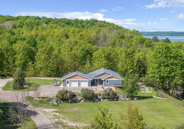 Photo 2 of Single family home for sale at 11660 Indian Rd, Kewadin, MI 49648 | MLS# 78080066865 | Listing updated on 2026-08-01