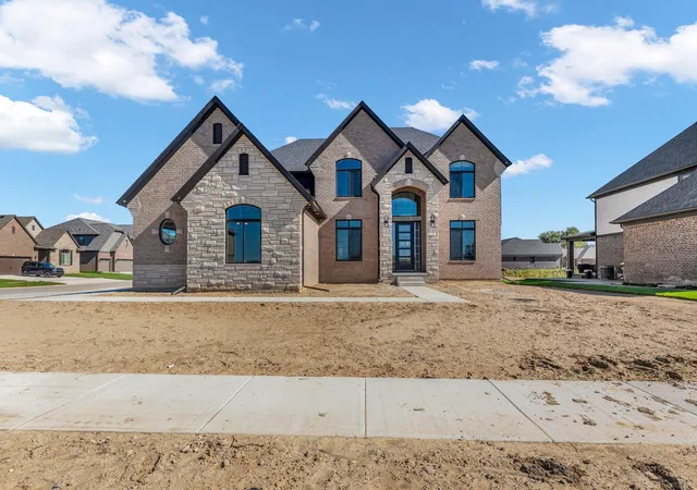 1st image of 49940 Langford Dr, Macomb Township Macomb, MI 48044 | MLS# 58050204307