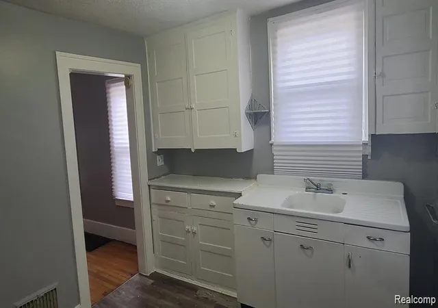 Photo 3 of Multi family home for sale at 12019 Woodmont Ave, Detroit, MI 48227 | MLS# 20261026484 | Listing updated on 2026-08-25