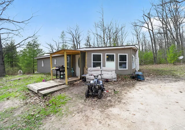 Single family home for sale at 11820 Big Tower Rd, Atlanta, MI 49709 | MLS# 61050205825