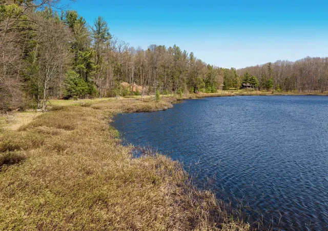 35th image of 03 Woodland Trl, Traverse City, MI 49684 | MLS# 78080067539