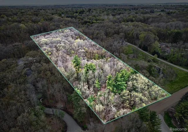 Photo 1 of Land for sale at 6944 Cooley Lake Rd, White Lake, MI 48383 | MLS# 20261030497 | Listing updated on 2026-09-14