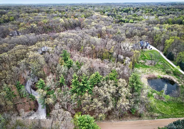 Photo 3 of Land for sale at 6944 Cooley Lake Rd, White Lake, MI 48383 | MLS# 20261030497 | Listing updated on 2026-09-14
