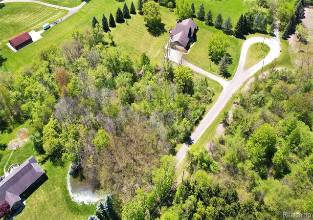 Photo 3 of Land for sale at 53183 Maranatha Ln, Wixom, MI 48393 | MLS# 20261033596 | Listing updated on 2026-07-06