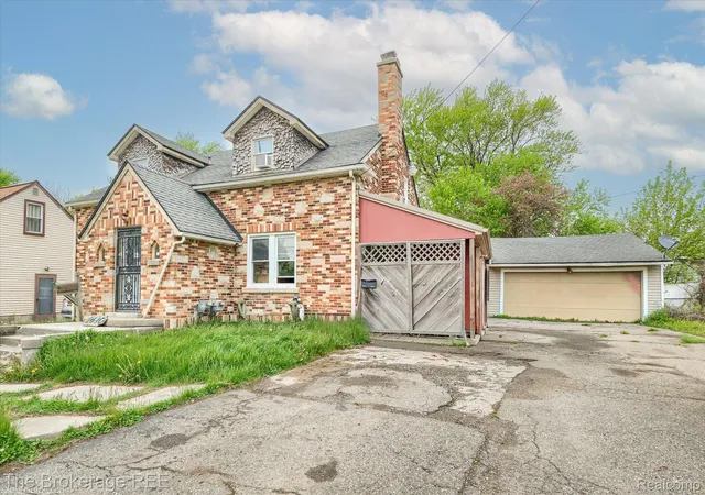 Photo 2 of Single family home for sale at 1410 W Atherton Rd, Flint, MI 48507 | MLS# 20261033654 | Listing updated on 2026-07-06