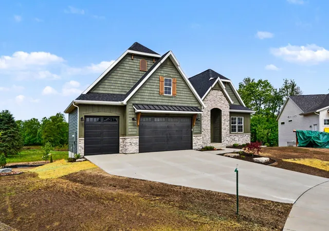 Photo 2 of Single family home for sale at 7814 Woodhurst Dr Ne, Rockford, MI 49341 | MLS# 65026021590 | Listing updated on 2026-09-04