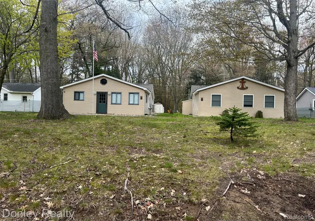 1st image of 977 Port Austin Rd, Port Austin, MI 48467 | MLS# 20261034527