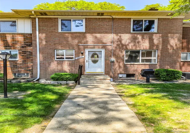 Listing Photo 1 - Condo for sale in building located at 19942 Vernier Rd, Harper Woods, MI 48225