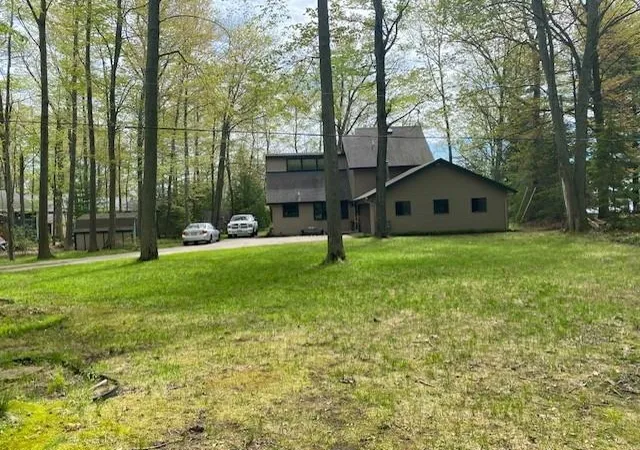 Photo 3 of Single family home for sale at 8779 Swan Point Rd, Elk Rapids, MI 49629 | MLS# 78080068754 | Listing updated on 2026-05-29