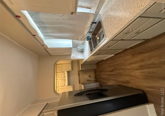 Photo 3 of Single family home for sale at 958 N Chevrolet Ave, Flint, MI 48504 | MLS# 20261038310 | Listing updated on 2026-10-01