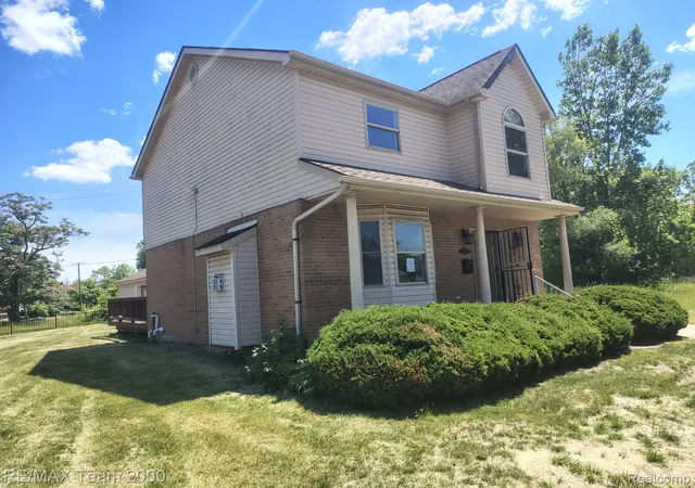 Photo 2 of Single family home for sale at 19452 Troy Pl, Highland Park, MI 48203 | MLS# 20261040706 | Listing updated on 2026-06-15