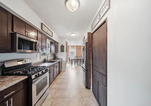 Photo 3 of Single family home for sale at 825 Gerald Ave, Jackson, MI 49203 | MLS# 55026027671 | Listing updated on 2026-06-21
