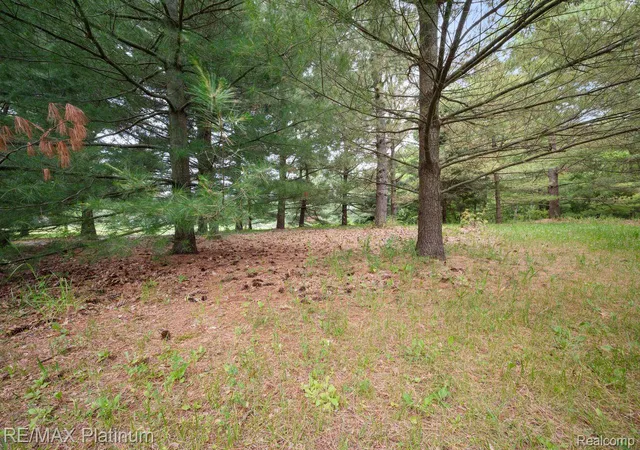 1st image of 12902 Autumn Ridge Ct, Milford, MI 48380 | MLS# 20261042121
