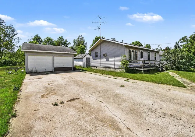 1st image of 561 Pembroke Dr, Grayling, MI 49738 | MLS# 65026028669