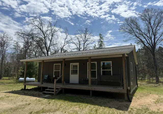 1st image of 5240 W 4 Mile Rd, Irons, MI 49644 | MLS# 67026029070
