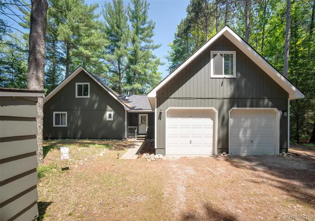 1st image of 6954 Aarwood Trl Nw, Rapid City, MI 49676 | MLS# 20261044321