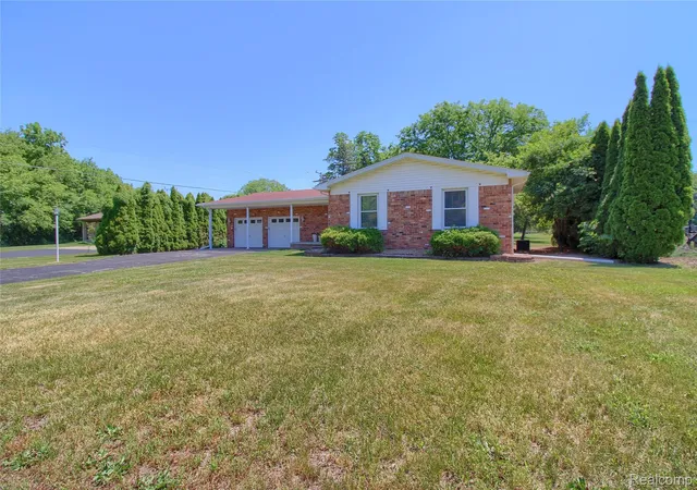 Photo 2 of Single family home for sale at 21515 Huron River Dr, New Boston, MI 48164 | MLS# 20261044435 | Listing updated on 2026-06-17