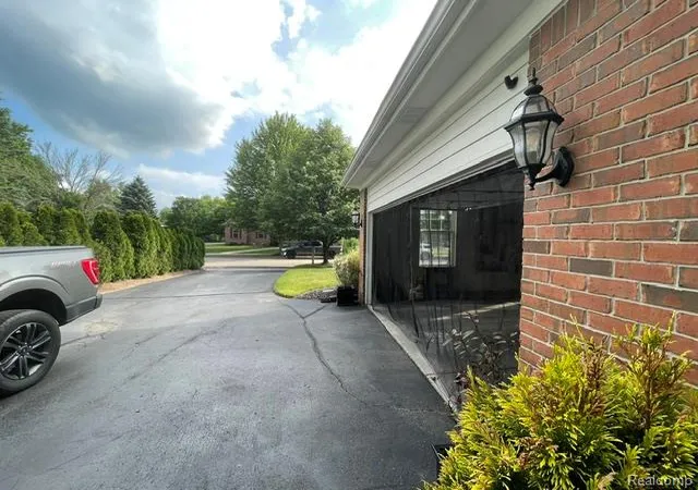 Photo 3 of Single family home for sale at 5827 Woodfield Pkwy, Grand Blanc, MI 48439 | MLS# 20261045507 | Listing updated on 2026-10-06