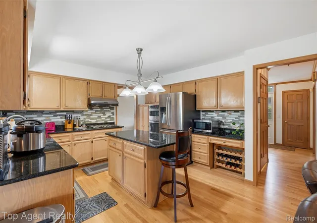Photo 3 of Single family home for sale at 52825 Seven Oaks Dr, Utica, MI 48316 | MLS# 20261045561 | Listing updated on 2026-08-17