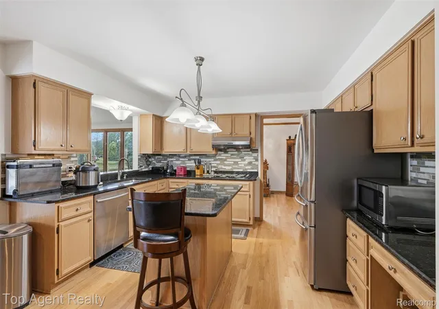 Photo 4 of Single family home for sale at 52825 Seven Oaks Dr, Utica, MI 48316 | MLS# 20261045561 | Listing updated on 2026-08-17