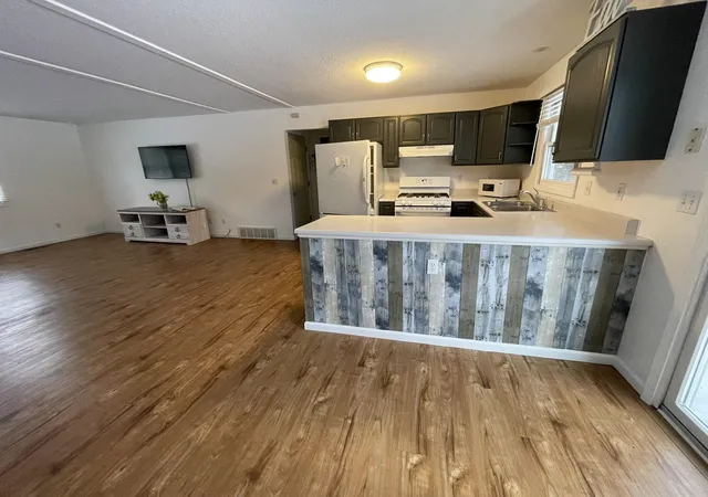 1st image of 10511 Lake Of The Woods Rd, Mancelona, MI 49659 | MLS# 79080069871