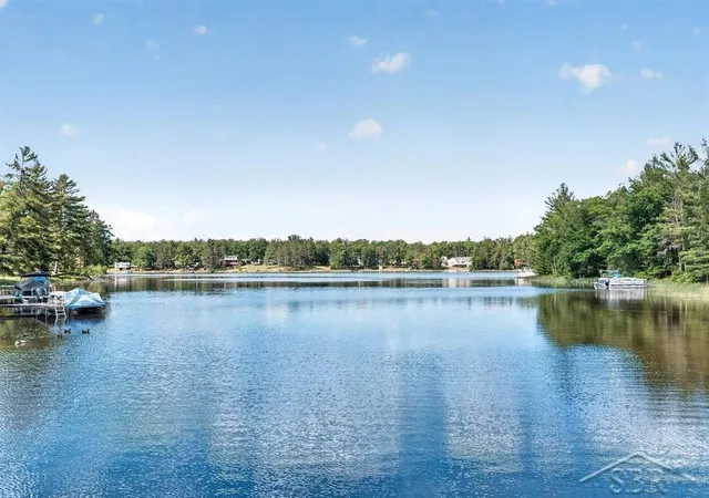 Photo 3 of Single family home for sale at 7059 Chain Lake Dr, Plainfield Township Iosco, MI 48761 | MLS# 61050211888 | Listing updated on 2026-08-26