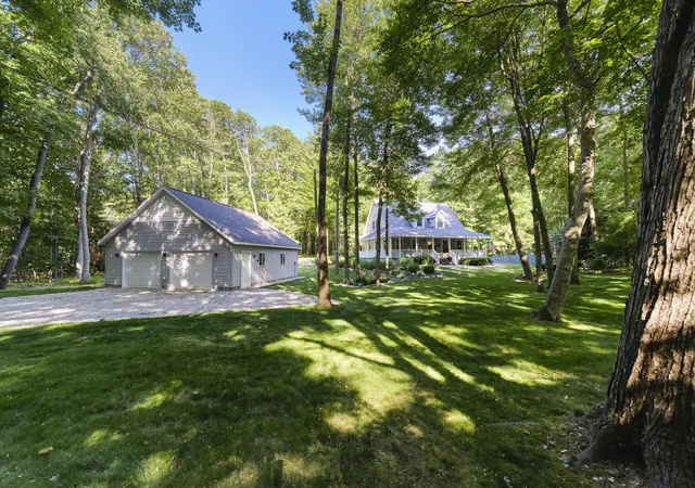 55th image of 10826 Old Freesoil Rd N, Manistee, MI 49660 | MLS# 67026030472