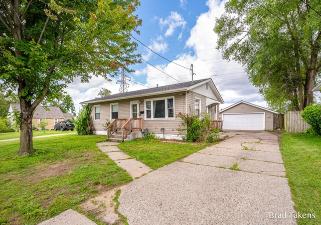 Photo 1 of Single family home for sale at 1852 Collingwood Ave Sw, Wyoming, MI 49519 | MLS# 65026030504 | Listing updated on 2026-06-20