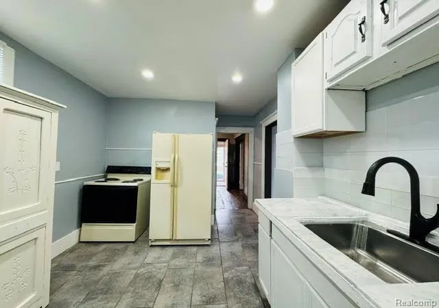 Photo 3 of Single family home for sale at 7714 E Canfield St, Detroit, MI 48214 | MLS# 20261048392 | Listing updated on 2026-07-06