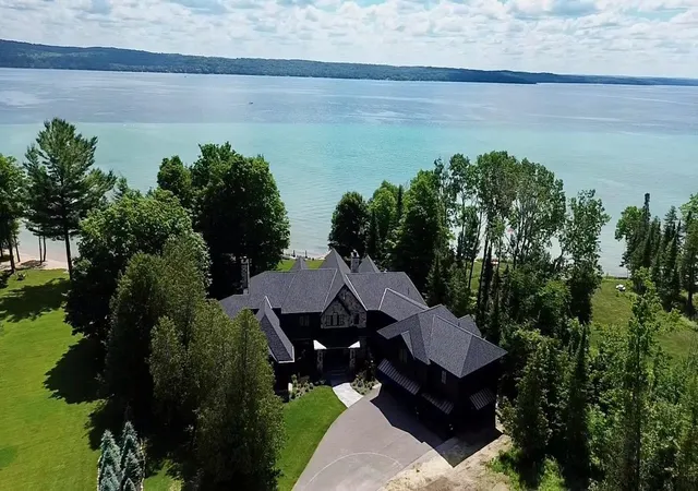 Photo 1 of Mansion for sale at 607 Nw Torch Lake Dr, Kewadin, MI 49648 | MLS# 78080070402 | Listing updated on 2026-07-02