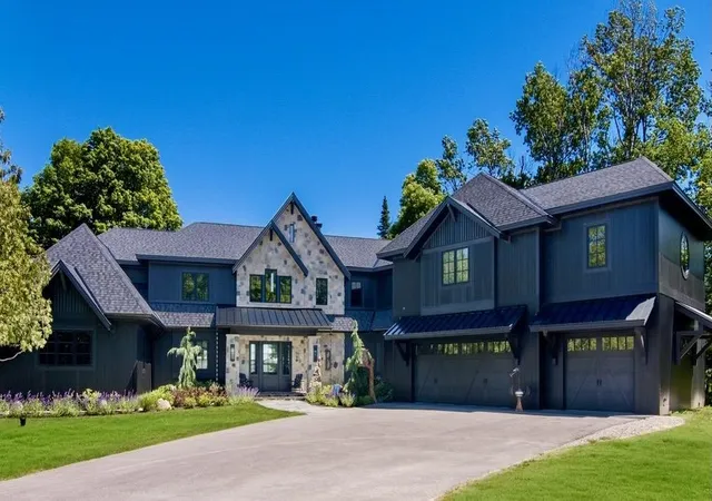 Photo 2 of Mansion for sale at 607 Nw Torch Lake Dr, Kewadin, MI 49648 | MLS# 78080070402 | Listing updated on 2026-07-02