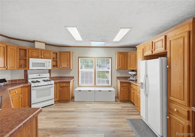 Photo 4 of Single family home for sale at 11078 Stony River Ct #522, South Lyon, MI 48178 | MLS# 20261049519 | Listing updated on 2026-07-06