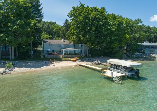 Photo 1 of Single family home for sale at 11711 S W Bay Shore Dr, Traverse City, MI 49684 | MLS# 78080070537 | Listing updated on 2026-09-10
