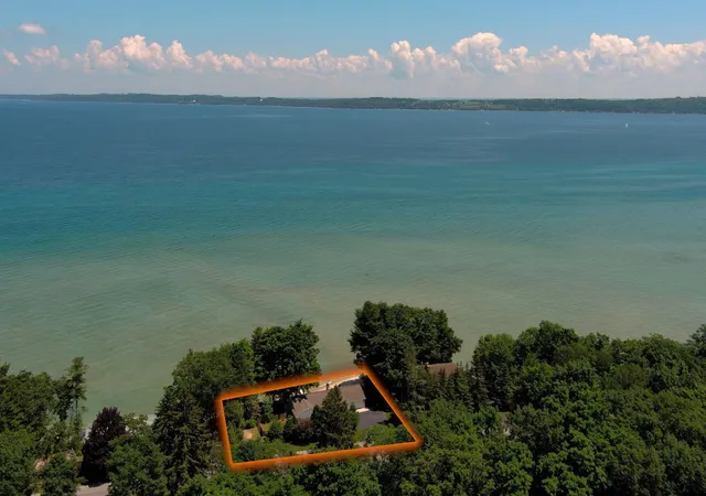 Photo 3 of Single family home for sale at 11711 S W Bay Shore Dr, Traverse City, MI 49684 | MLS# 78080070537 | Listing updated on 2026-09-10