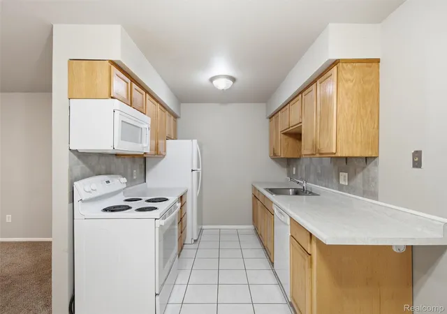 Listing Photo 3 - Condo for sale in building located at 34670 Clarkson Dr W, Macomb, MI 48026
