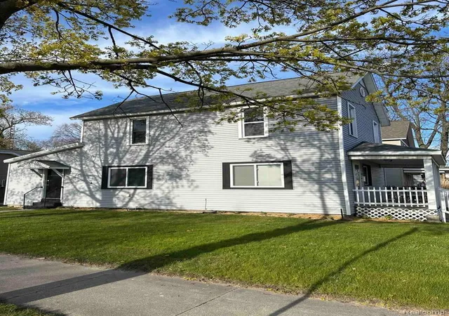 Photo 2 of Single family home for sale at 310 W Court St, Ludington, MI 49431 | MLS# 20261050865 | Listing updated on 2026-07-22