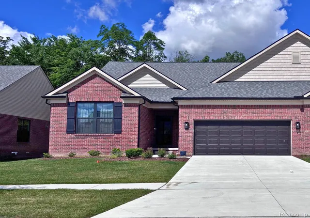 Photo 1 of Condo for sale at 55789 Oak Pointe Dr, Utica, MI 48315 | MLS# 20261051032 | Listing updated on 2026-07-07